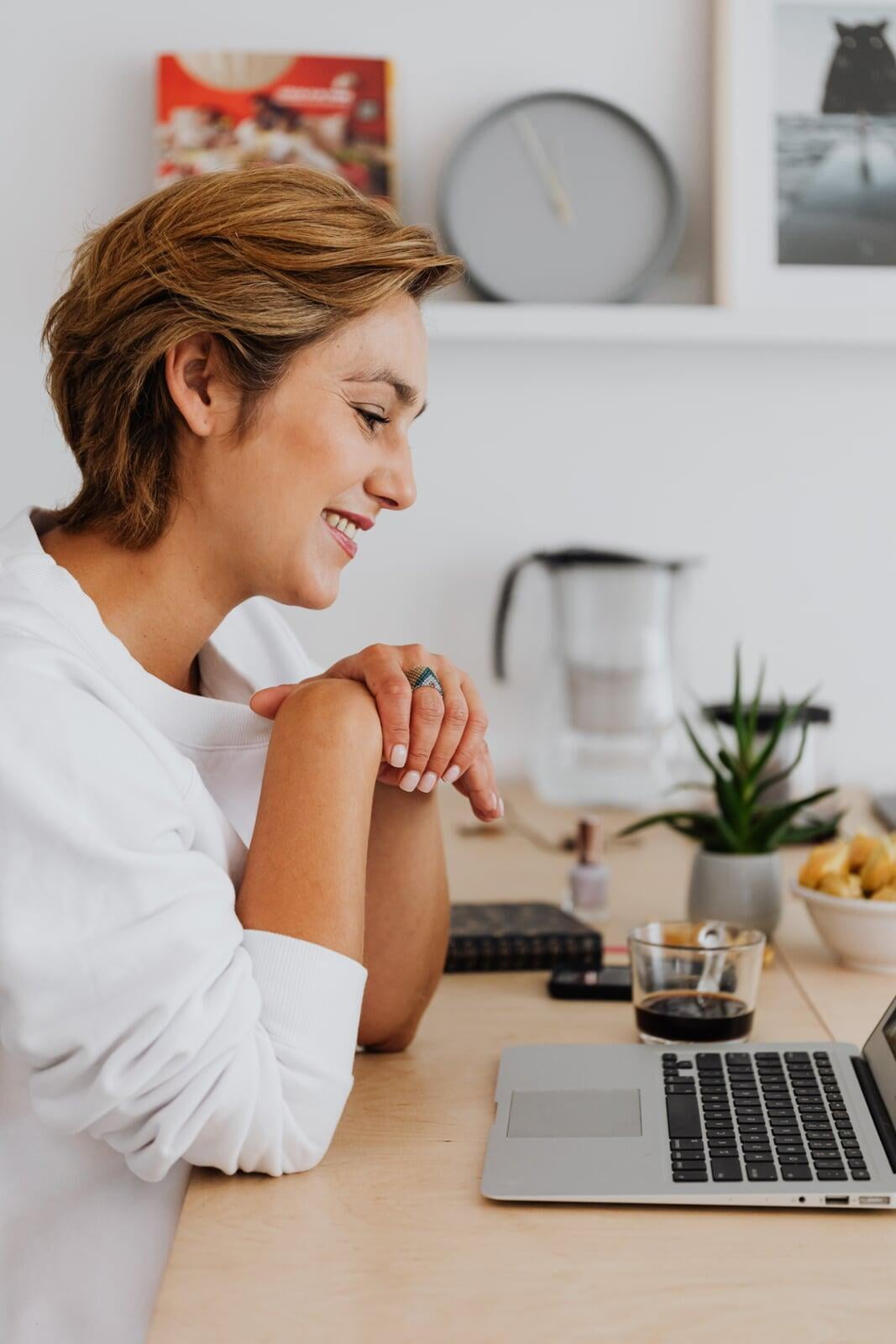 Picture of a girl doing an online meeting on her laptop